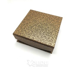 Brownish mottled box with magnet